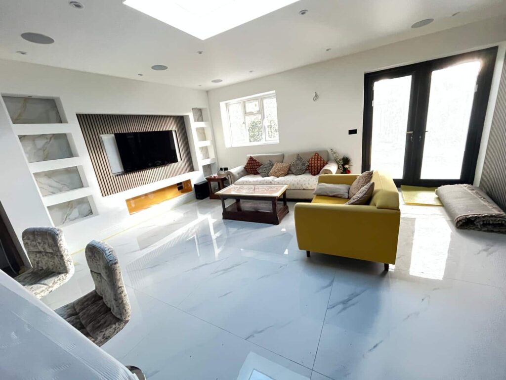 Sitting room furniture being moved during a home removal in Eastcote Ruislip HA4